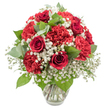 A romantic red and white floral arrangement stands poised in a clear glass vase, photographed against a clean white background that gives it a crisp, gallery-like feel, much like a carefully styled window display in Chinatown. At the centre, deep red roses unfurl in layered spirals, their velvety petals catching the light and casting gentle shadows that hint at both passion and tenderness. Encircling these roses, generous clusters of red carnations create volume and texture, their frilled petals forming soft waves that make the bouquet seem rich and abundant, as if ready to be carried to a celebration near Leicester Square. Threaded through this sea of red, sprays of white baby's breath rise on slim stems, each tiny blossom glistening like a star against the darker tones and lending a sense of purity and quiet elegance. Fresh greenery, including dark, glossy rose leaves and rounded eucalyptus with its soft silvery-green hue, is tucked thoughtfully throughout, adding shape, contrast, and a touch of garden freshness that offsets the intensity of the blooms. The clear glass vase offers a full view of the stems and clean water inside, reinforcing a sense of honesty and care in the design, as you might expect from a trusted local florist in Chinatown Flowers. The arrangement has been crafted into a rounded, dome-like form that feels complete and harmonious, perfect for intimate dinners, romantic gestures, or thoughtful gifts delivered across Chinatown, Soho, and the surrounding West End. Its bold colour palette and classic flower choice make it ideal for anniversaries, Valentine's surprises, or any moment when you want to send a message of love and celebration in the heart of London.